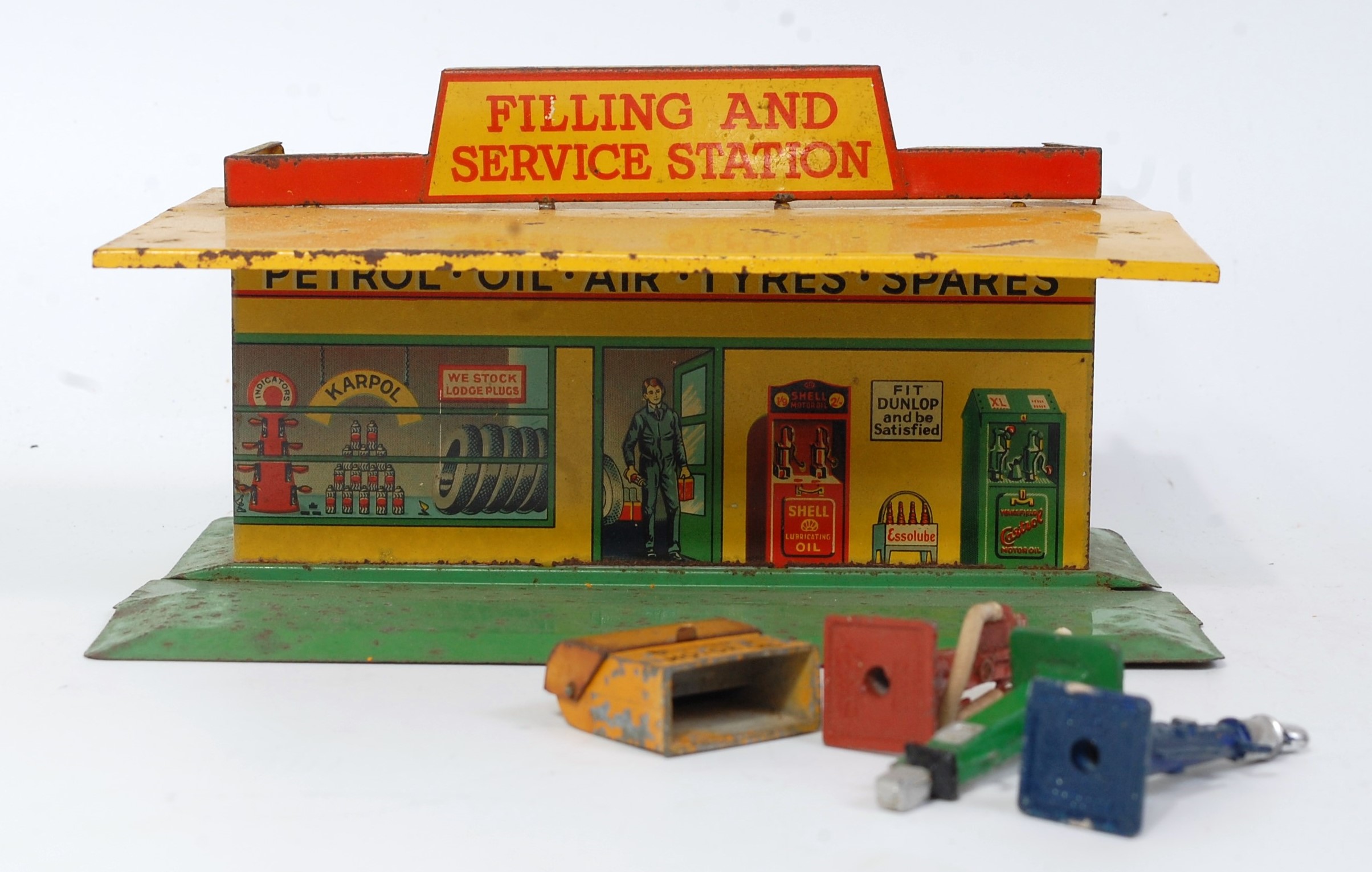 A Dinky Toys No. 48 pre-war filling and service station comprising of yellow and orange body