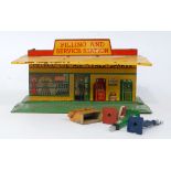 A Dinky Toys No. 48 pre-war filling and service station comprising of yellow and orange body