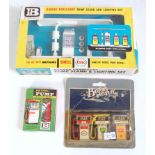 A Britains Models No. 4260 garage forecourt pump stand and lighting set, appears complete, in the