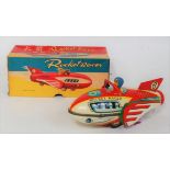 A Chinese tinplate and friction drive model No. MF735 Rocket Racer comprising of red, yellow,