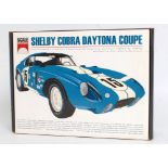 A Scale Motor Sport 1/24 scale multi media kit for a Shelby Cobra Daytona Coupe, appears as issued