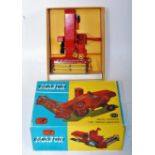 A Corgi Toys No. 1111 Massey Ferguson 780 combine harvester comprising of red body with yellow tines