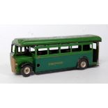A Triang Minic No. 52M Greenline single decker bus comprising of two-tone green body with spun hubs,