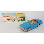 A Chinese No. MF191 tin plate and friction drive open car comprising of blue body with detailed