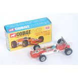 A Corgi Toys No. 158 Lotus Climax F1 racing car, comprising orange and white body with racing No.