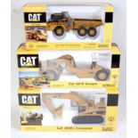 A Norscot 1/50 scale boxed construction vehicle diecast group, all Caterpillar related to include