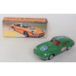 A Made in Korea No. 62918 tin plate and friction drive model of a Jaguar E-type racing car,