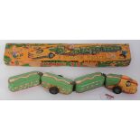 A TN Nomura tin plate and friction drive model of a snake train, comprising of four various