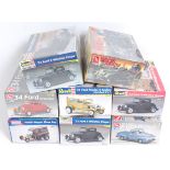 Eight various boxed as issued Revell, AMT/ERTL and Monogram 1/24 and 1/25 scale 4x4 and Ford