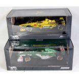 Five various boxed 1/18 scale F1 racing diecasts to include an Eddie Irvine Jaguar R1 F1 racing car,