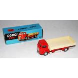 A Corgi Toys No. 452, five ton dropside lorry comprising red cab and chassis with cream back and