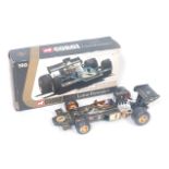 A Corgi Toys No. 190 JPS Lotus F1 car, 1/18 example, housed in the original all-card box with