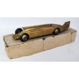 A Gunthermann tinplate and clockwork Golden Arrow Landspeed record car, appears complete with gold