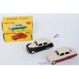 A Dinky Toys boxed saloon group to include No. 161 Austin Somerset saloon comprising of cream and