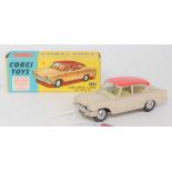 A Corgi Toys No. 234 Ford Consul Classic saloon comprising of cream and pink body with yellow