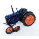 A Chad Valley No. 9235 clockwork model of a Fordson Major tractor, model requires restoration,