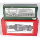 An Old Cars 1/43 scale boxed racing car transporter diecast group to include a 1956 Fiat 642