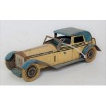A Wells o London, 1935 tinplate Rolls Royce Sedanca finished in cream and blue with single fixed key