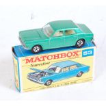 A Matchbox Superfast No. 53 Ford Zodiac comprising of metallic green body with white interior and