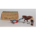 A Britains Farm Series No. 142F single horse plough, appears complete in the original duck-egg all-