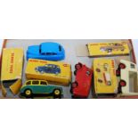 Four various boxed and playworn Dinky Toy diecasts, all boxes with some significant damage to