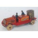 An early 20th century tinplate and clockwork model of a Wells Fire Engine, missing some components