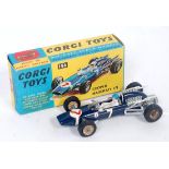 A Corgi Toys No. 156 Cooper Maserati F1 racing car, comprising dark blue body with gold hubs and