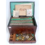 A mahogany collectors chest containing a quantity of various early 20th century base metal Meccano