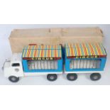 A Triang Toys tinplate and pressed steel model of a circus on tour truck and trailer, comprising