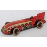 A Wells of London (UK) pre-war tin plate and clockwork racing car, stylised on a landspeed record