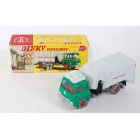A Dinky Toys No. 978 Refuse Wagon comprising of green cab with silver chassis and light grey back,