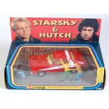 A Corgi Toys No. 292 Starsky & Hutch Ford Torino comprising of white & red car with lemon yellow