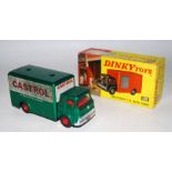 A Dinky Toys No. 450 Bedford TK box van comprising of metallic green cab and chassis and back with