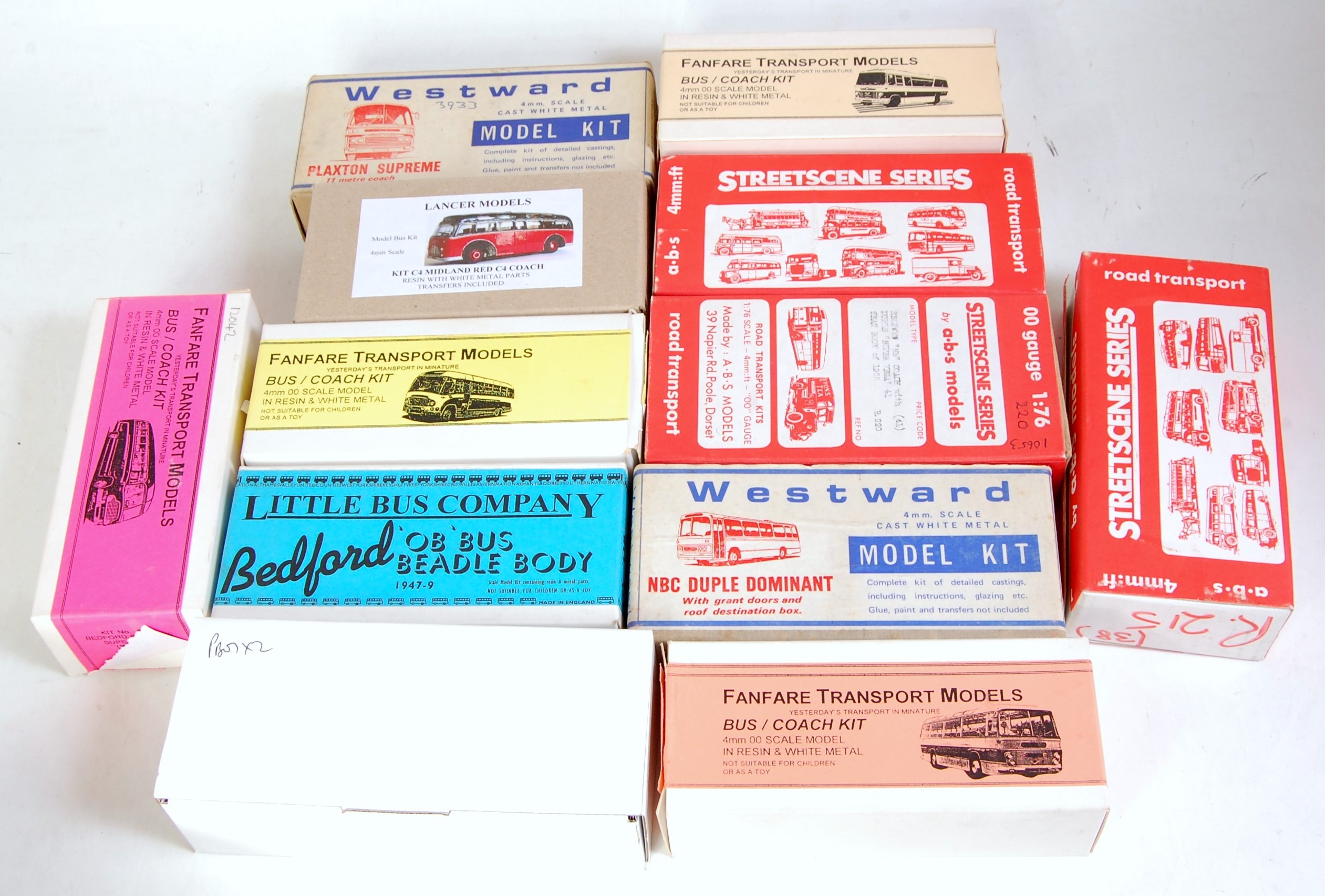 12 various boxed white metal and resin vintage public transport kits to include Fanfare Transport