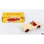 A Dinky Toys No. 103 Austin Healey 100 sports car comprising cream body with red interior and red