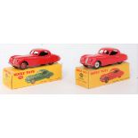 A Dinky Toys No. 157 boxed Jaguar XK120 coupe diecast group to include a light red example with spun