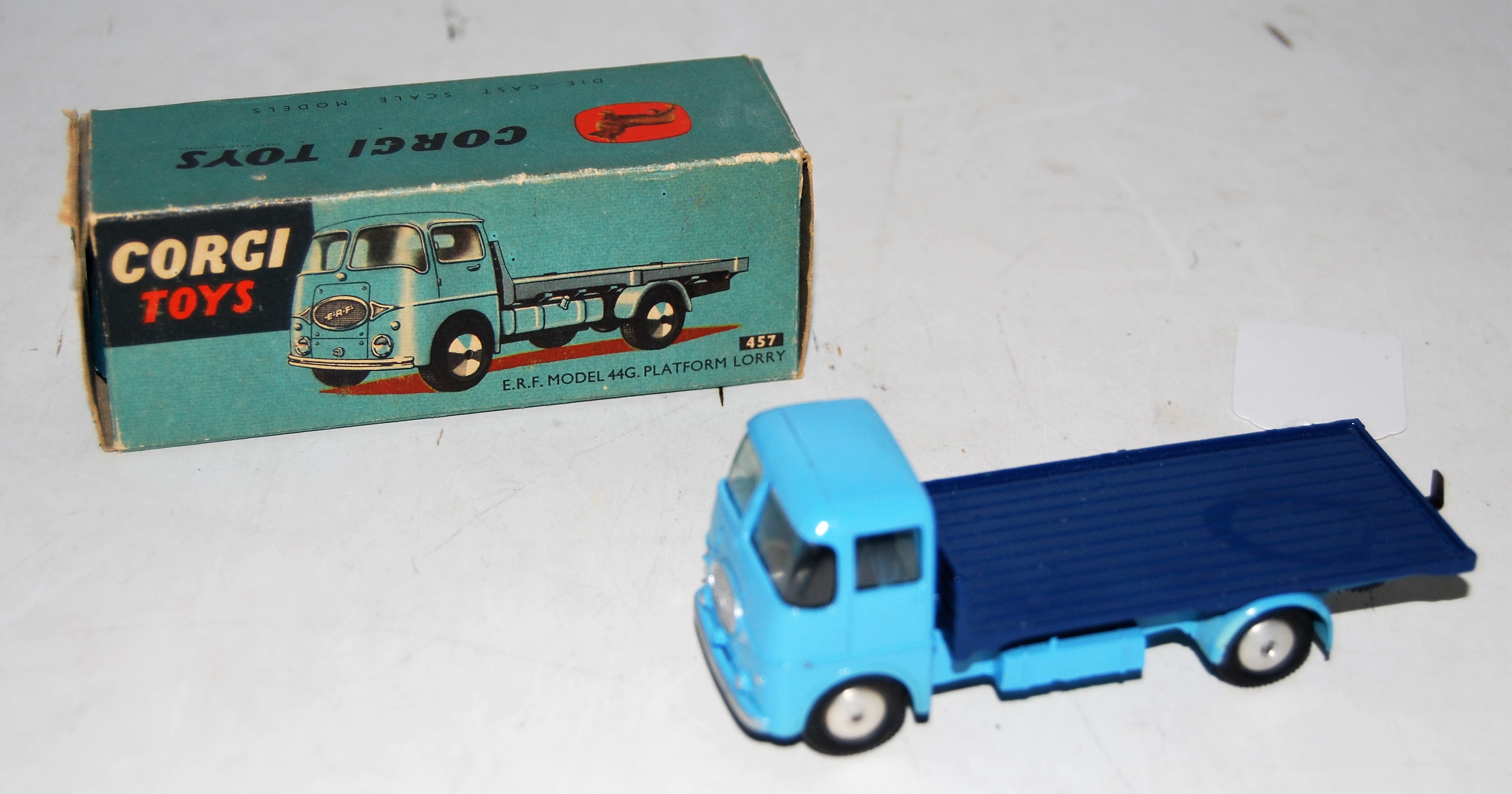 A Corgi Toys No. 457 ERF model 44G platform lorry comprising two-tone blue body with flat spun