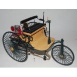 A Franklin Mint Precision Models 1/8 scale model of an 1886 Benz motor wagon, appears as issued in