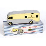 A Dinky Toys No. 979 Newmarket Race Course horse transporter comprising yellow and grey body with