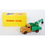 A Dinky Toys No. 430 Dinky Service breakdown lorry comprising of tan cab and chassis with green back