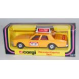 A Corgi Toys No. 327 Chevrolet Caprice Taxi comprising orange body with red interior and chrome hubs