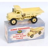 A Dinky Toys No. 965 Euclid rear dump truck comprising of yellow body with yellow cast hubs and