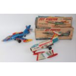 A boxed Japanese tinplate and friction powered aircraft group to include an ASC Blue Star USAF-104
