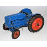 A Chad Valley diecast and clockwork model of Fordson Major tractor comprising of blue body with