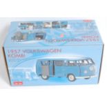 A Sunstar limited edition 1/12 scale model of a 1957 Volkswagen Combi van finished in RAF blue