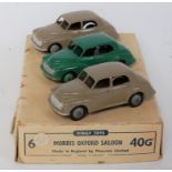 A Dinky Toys No. 40G trade box of six Morris Oxford saloons, containing three various models