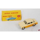 A Dinky Toys No. 166 Sunbeam Rapier saloon comprising of yellow lower body with cream upper body