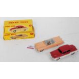 A Dinky Toys boxed saloon group to include No. 131 Cadillac tourer, together with No. 172 Studebaker