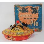 A Mettoy No. 6176 tin plate and musical action Blackbird Pie comprising of nicely tin printed pie