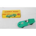 A Dinky Toys No. 236 Connaught racing car comprising green body with matching hubs and red